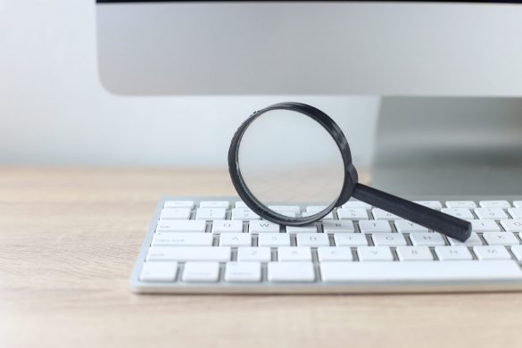 magnifying-glass-and-keyboard-for-seo-concept-2023-01-11-21-58-29-utc